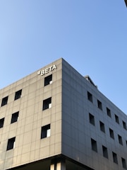 A modern office building representing bita's construction projects.