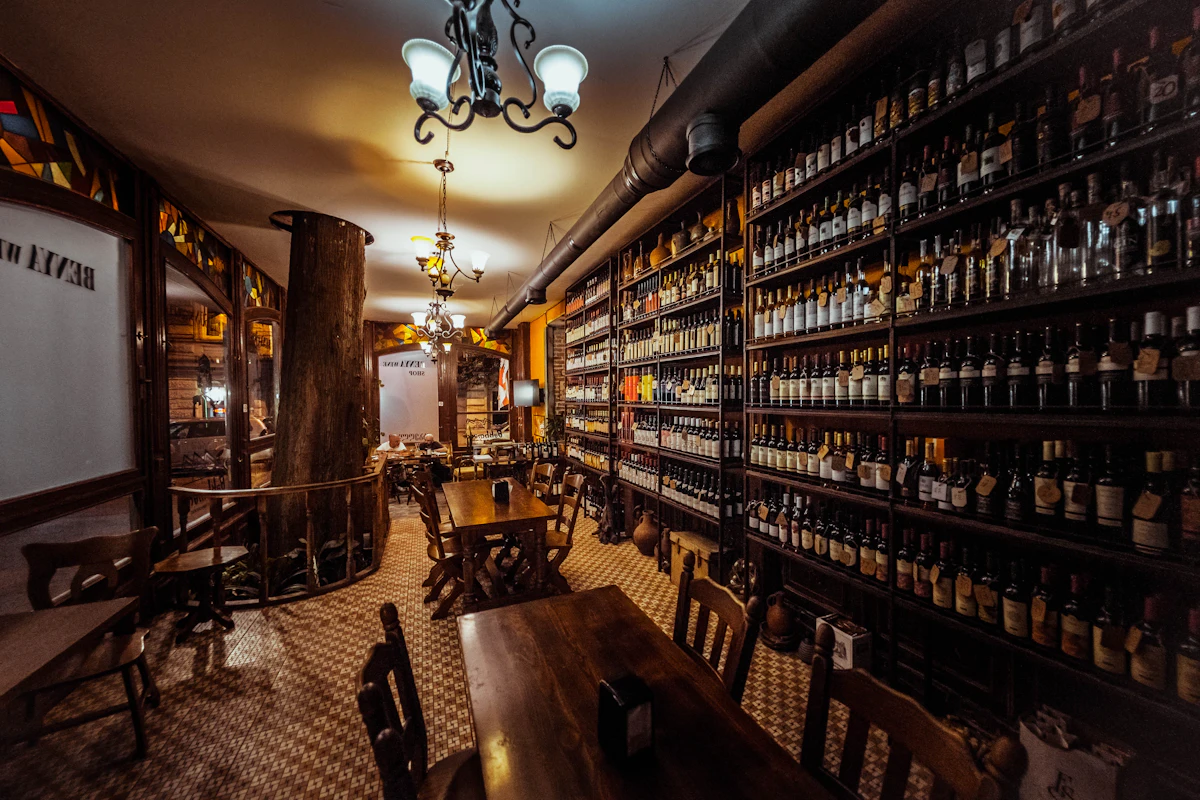 Wine cellar with bottles on shelves