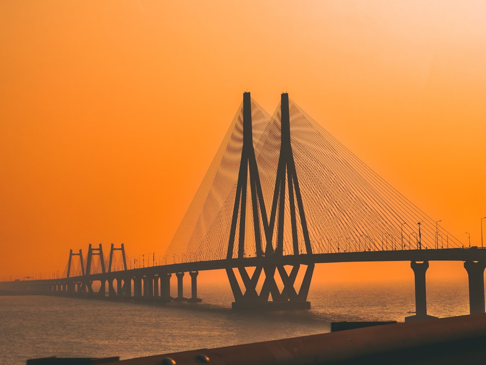 a large bridge spanning over a large body of water