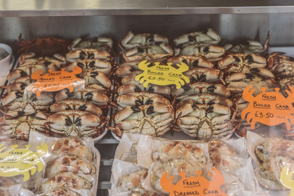 a display case filled with lots of different types of cookies