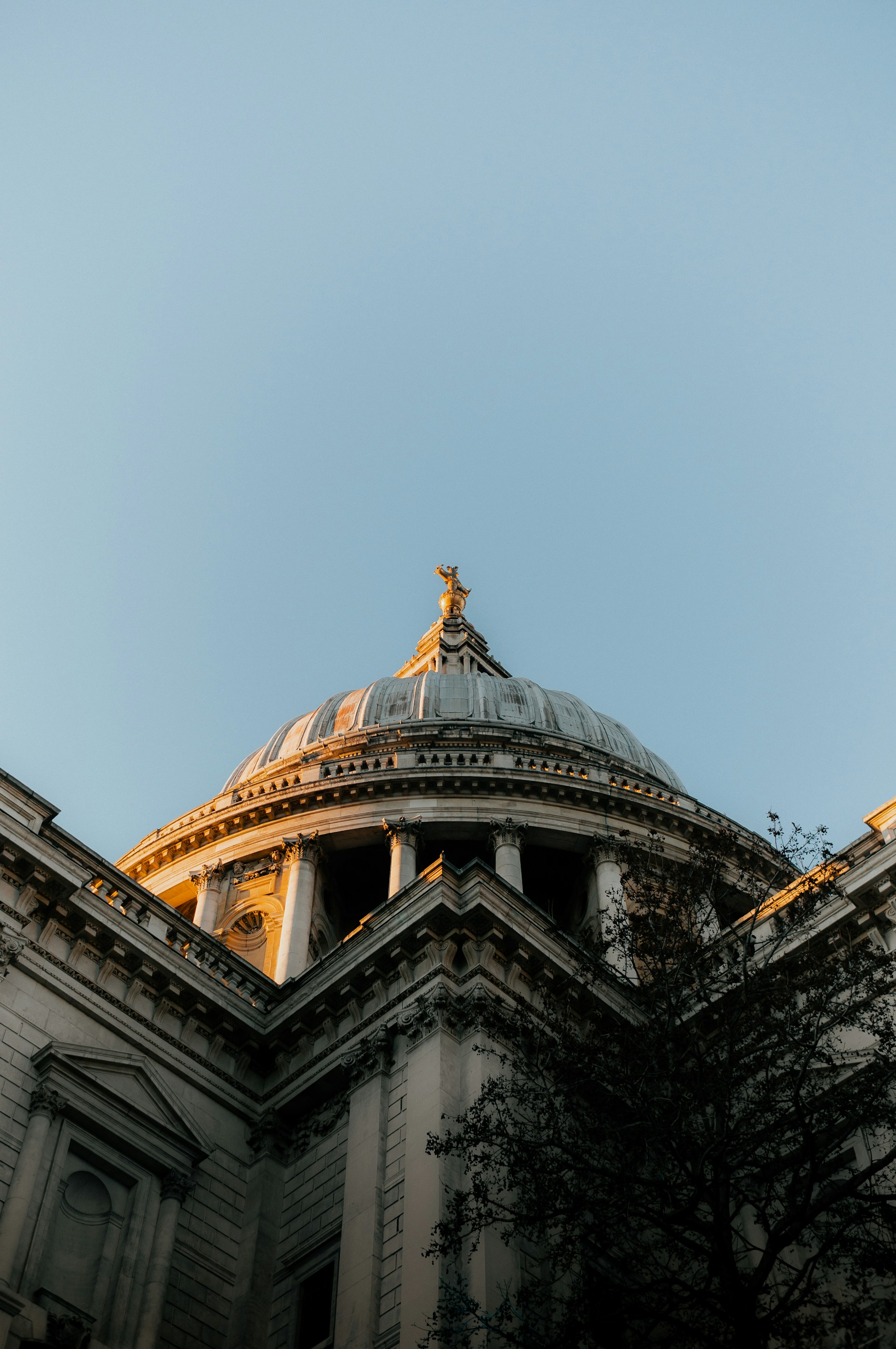 a tall building with a dome on top of it