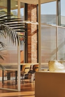 Interior 3D rendering of a contemporary living room with natural light.