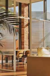 Modern 3D interior rendering showcasing a stylish living room with natural light.