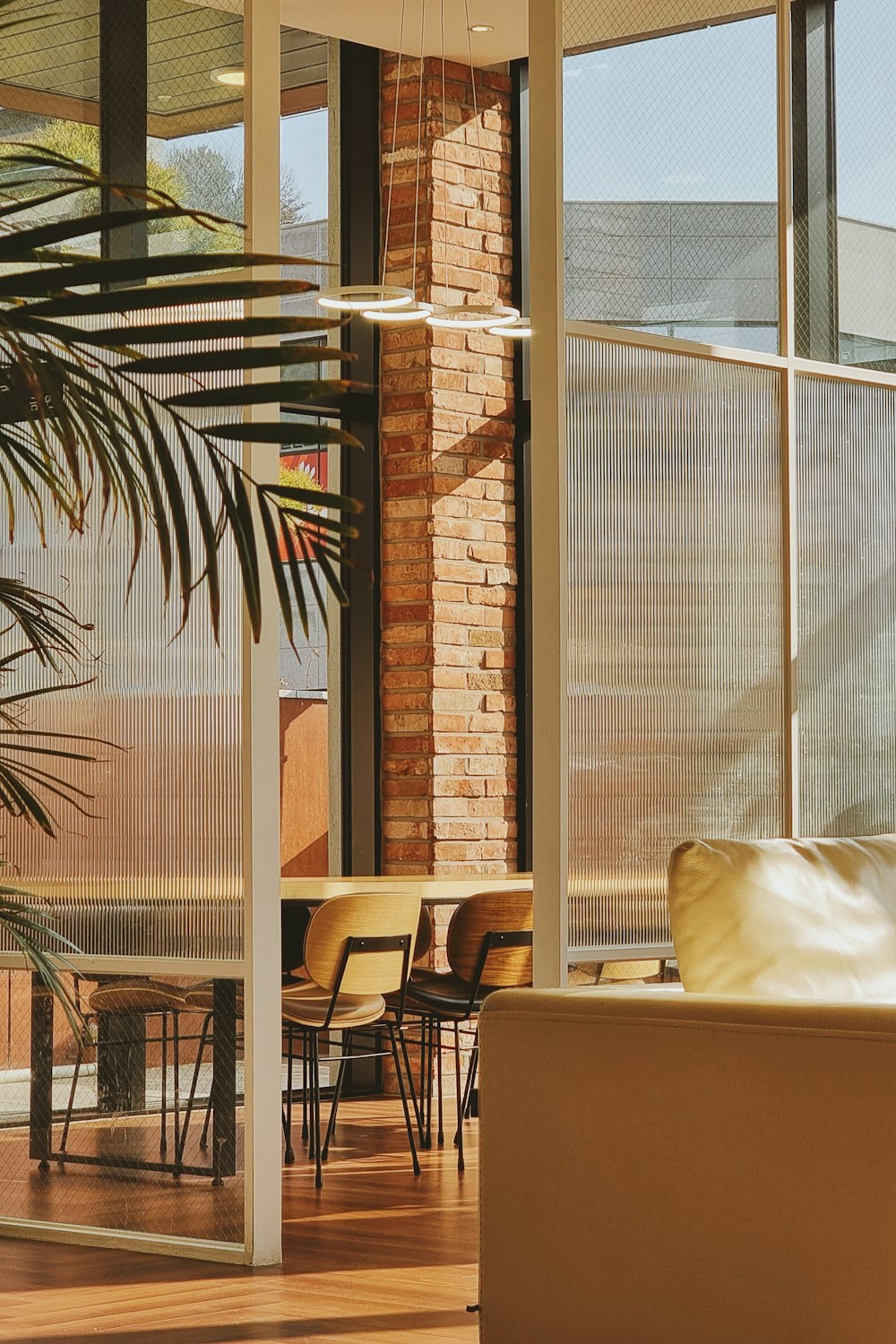 a living room filled with furniture and a large window