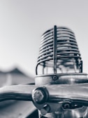 Black and white shot of a vintage microphone used for news reporting.