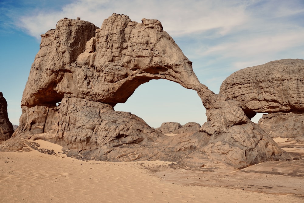 a rock formation in the middle of a desert