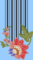 An ornate floral embroidery design features large red, blue, pink, and green flowers intertwined with leaves and vertical black stripes on a light blue background.