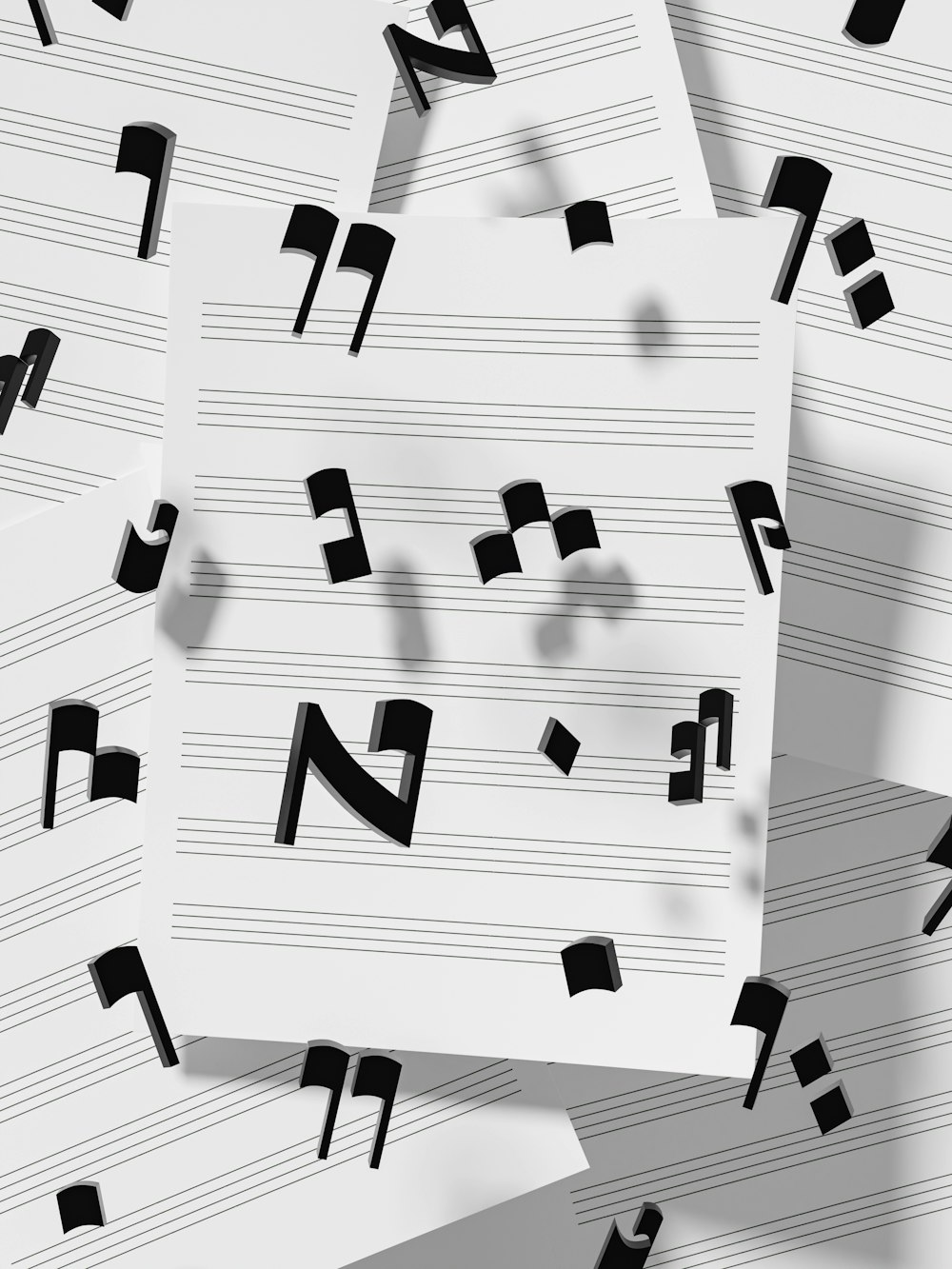 a pile of sheet music paper with musical notes