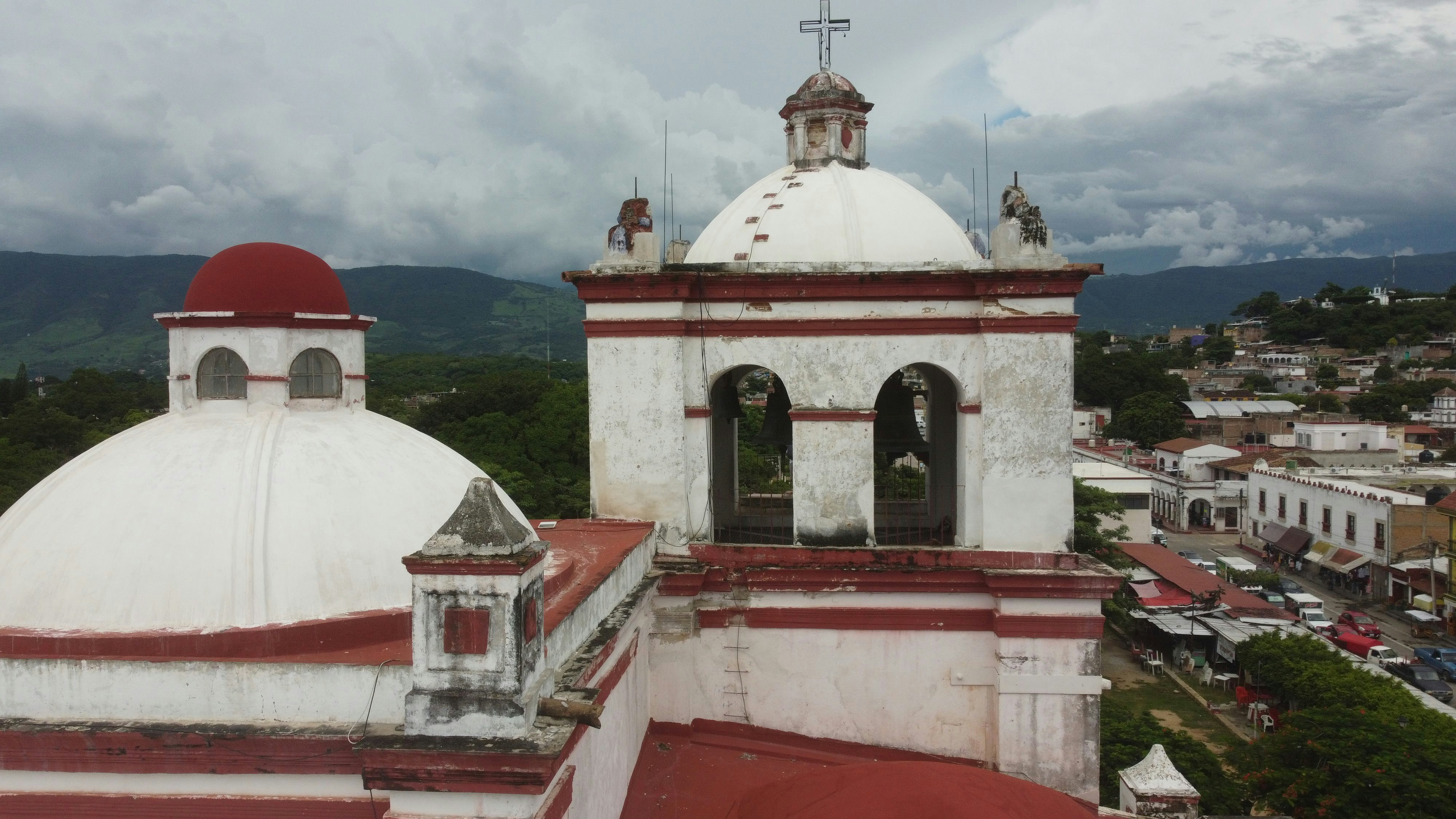 a large white building with a red roof