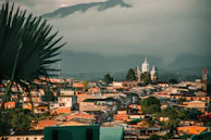 a view of a city with a mountain in the background