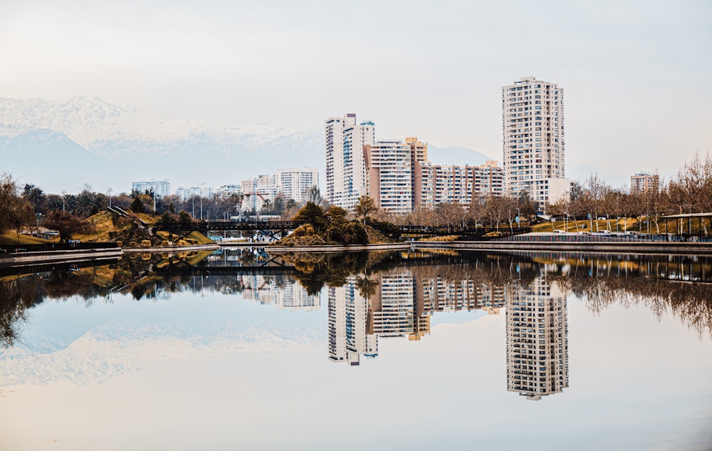 a large body of water surrounded by tall buildings