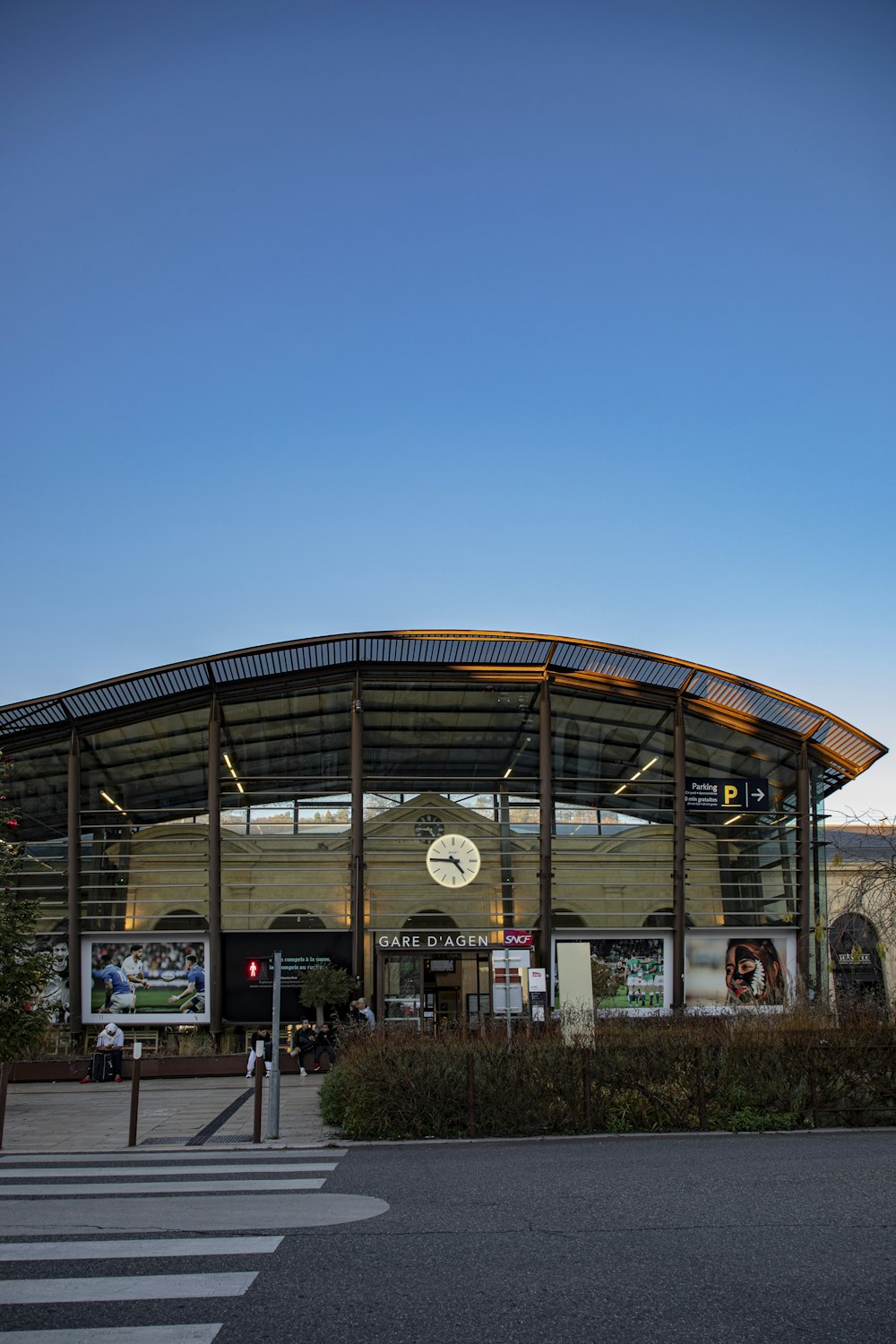 a large building with a clock on the front of it