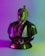a statue of a man in a purple and green outfit