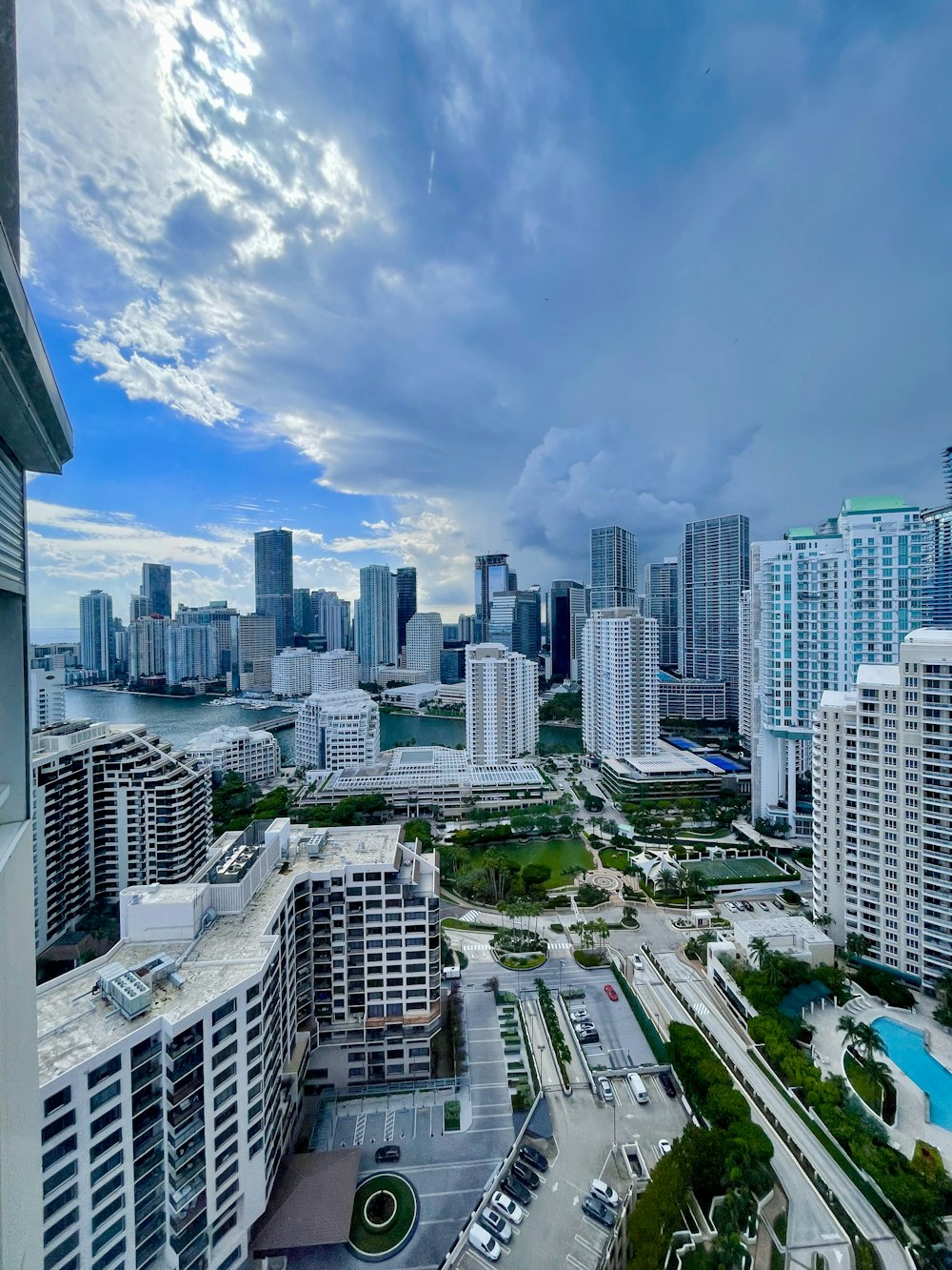 an aerial view of a city with tall buildings