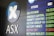 The image depicts a display board showing stock information, including stock names and bid values. The logo and letters 'ASX' are prominent on the left side, indicating a financial or stock exchange context.