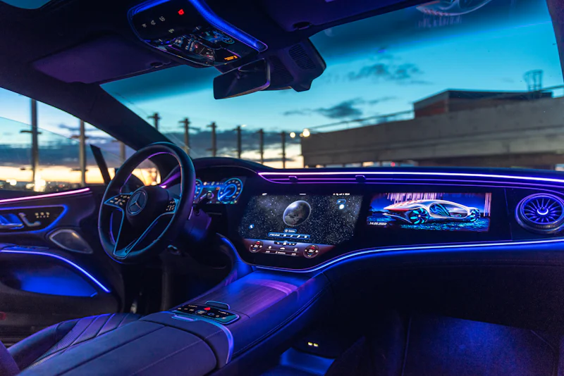 Car interior with blue ambient lighting glow