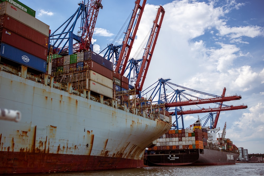 a large cargo ship docked in a harbor