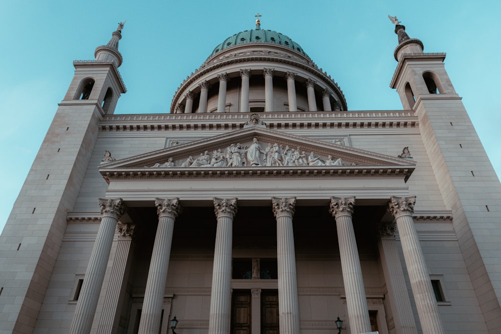 a large building with columns and a dome