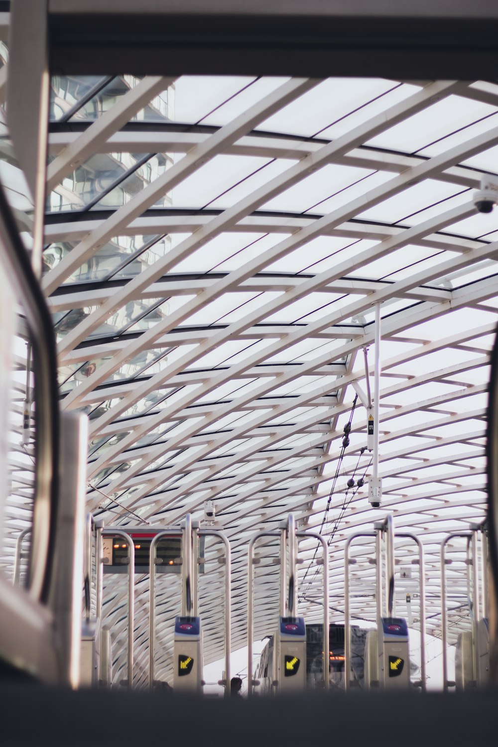 a train station with a row of empty seats