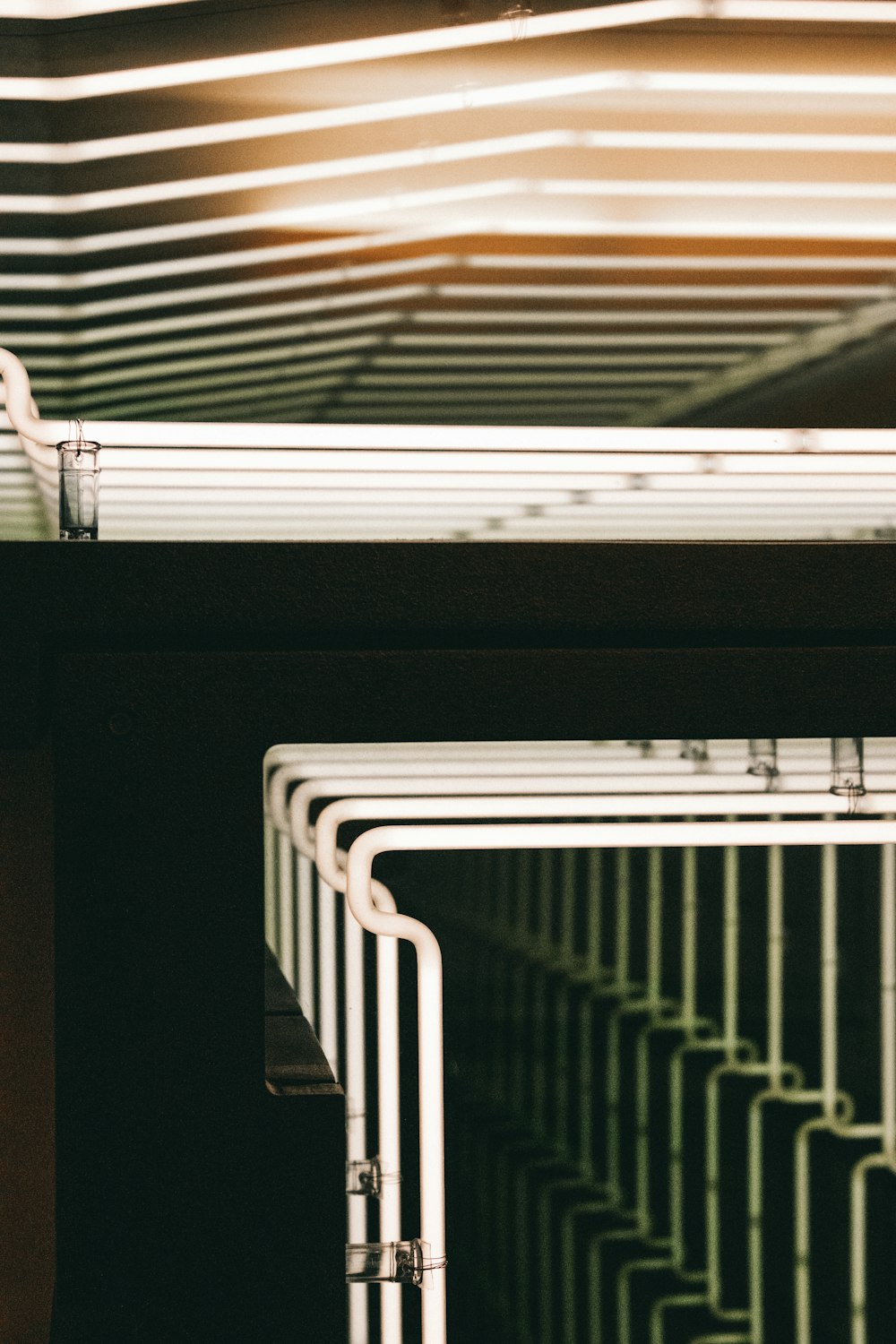 a close up of a row of metal bars