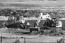 a black and white photo of a construction site