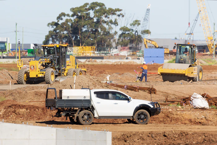Light pickup vehicle at a construction site