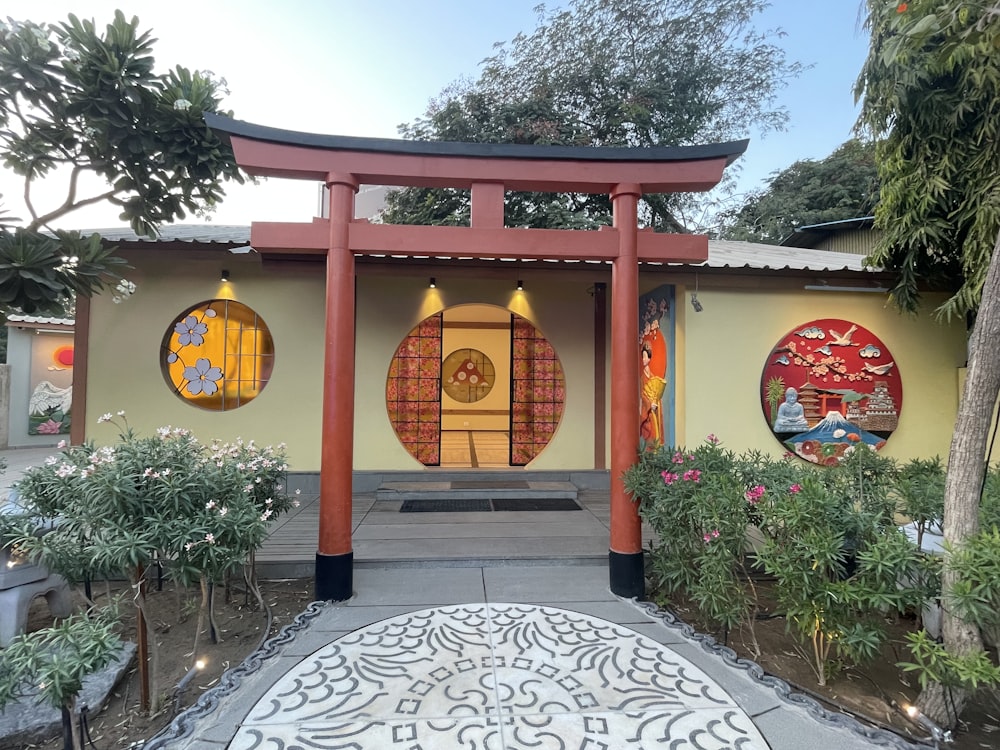 a building with a red and yellow entrance