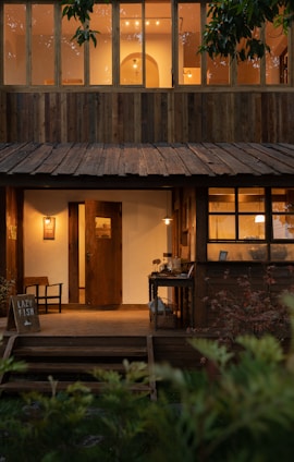 A cozy home setting featuring the Lazy Legend Club logo.