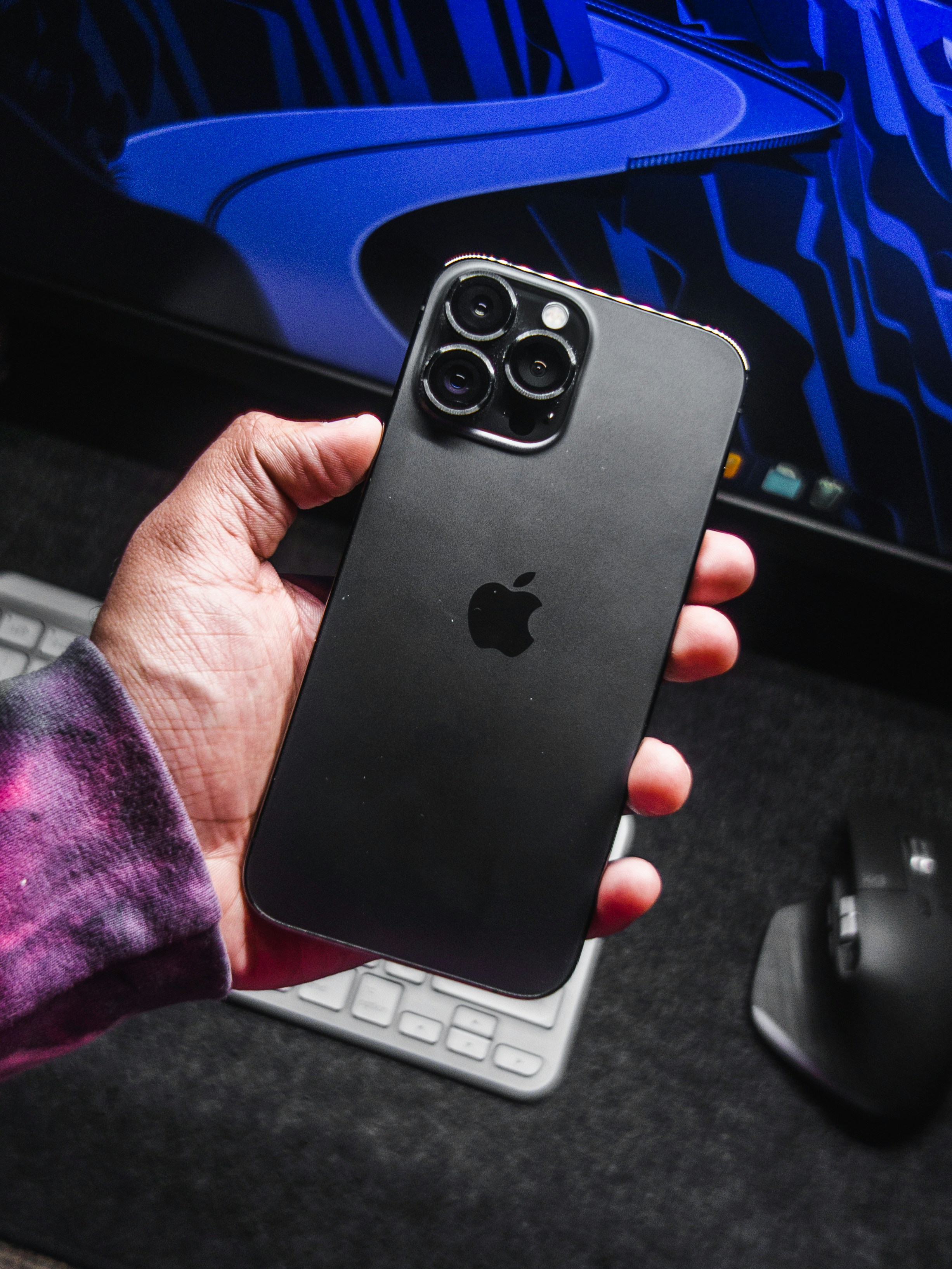 a person holding an iphone in their hand