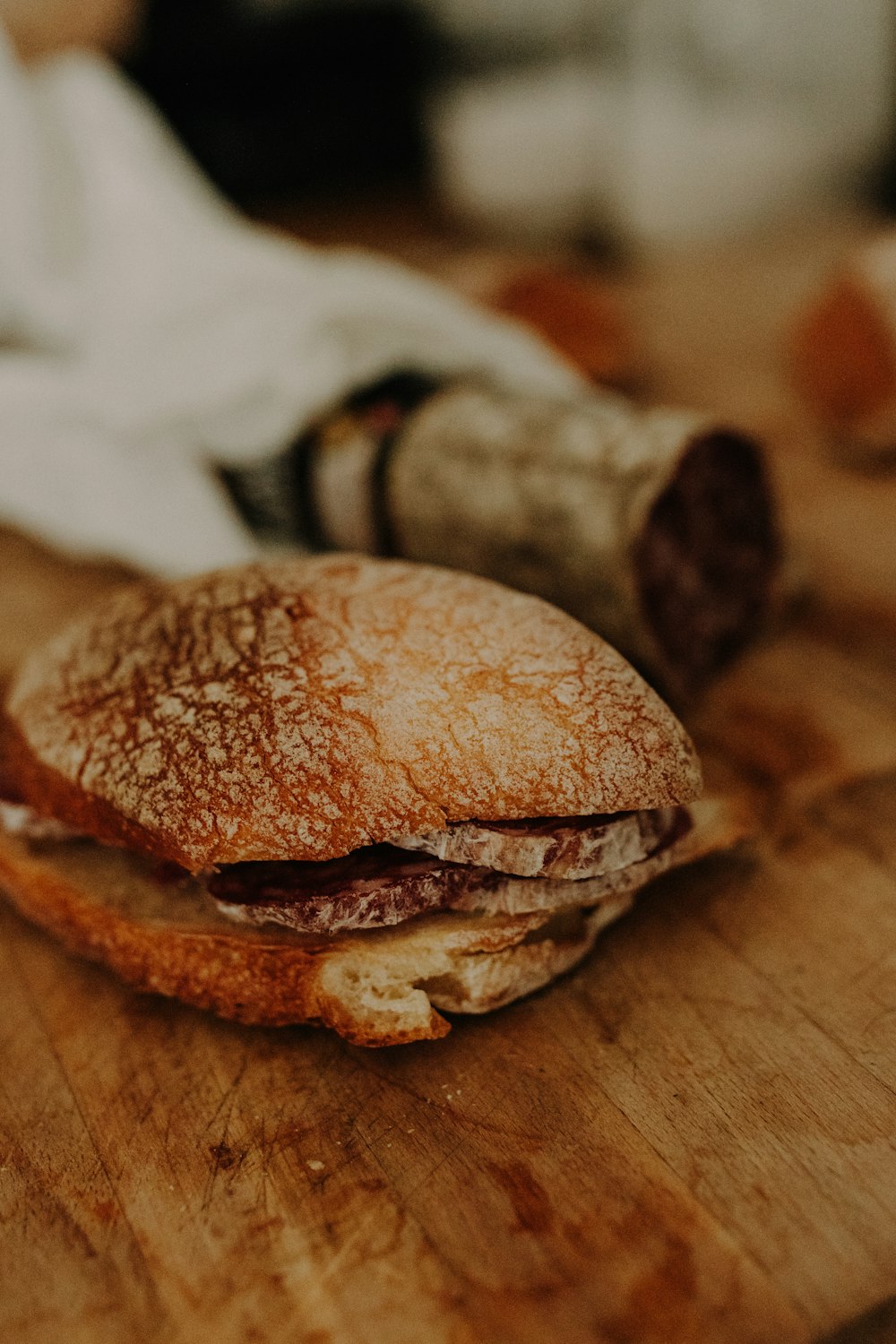 a close up of a sandwich on a cutting board