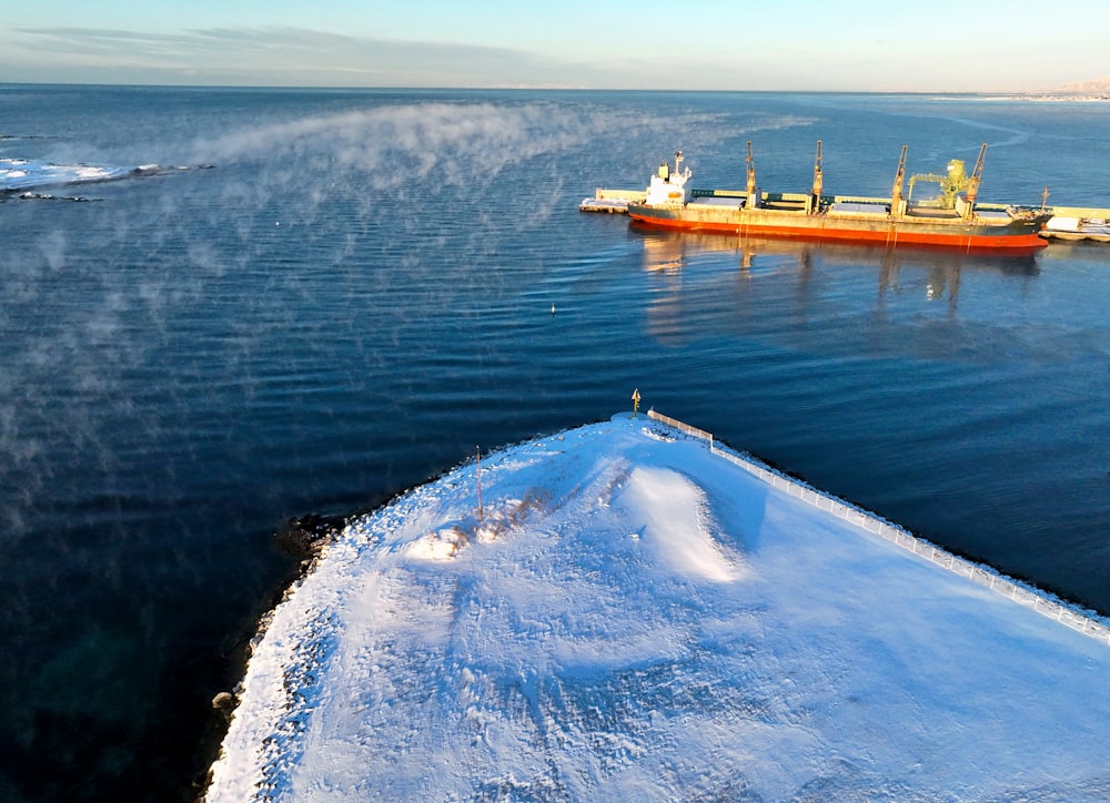 a large boat traveling across a large body of water