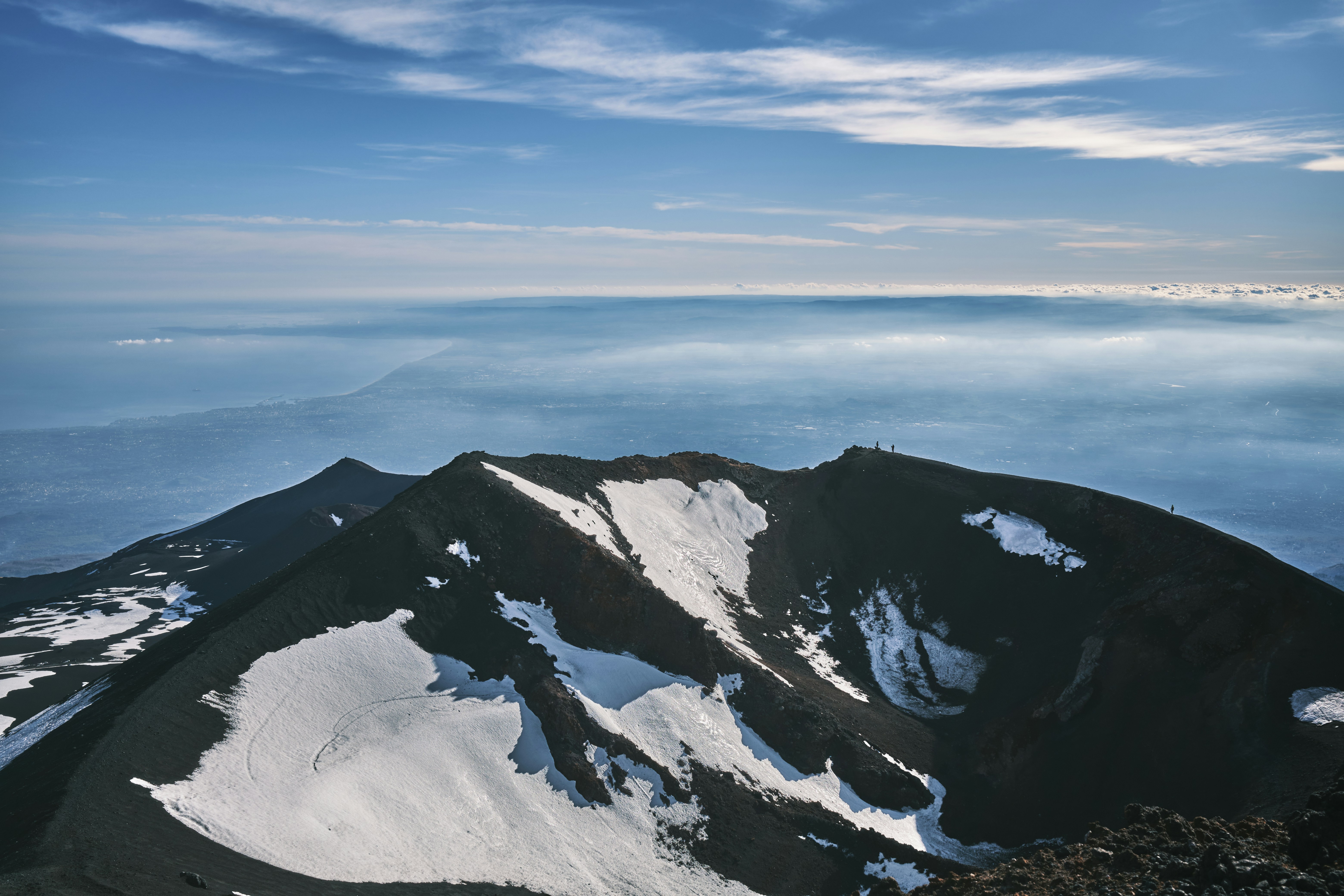 a view of a mountain with snow on it, 