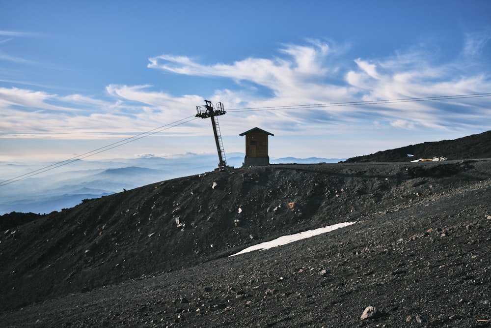 a hill with a house on top of it