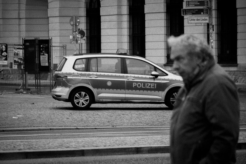 a police car parked on the side of the road