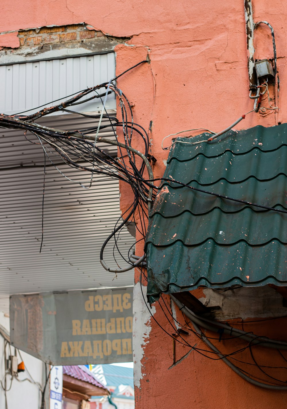 a building that has a bunch of wires on it