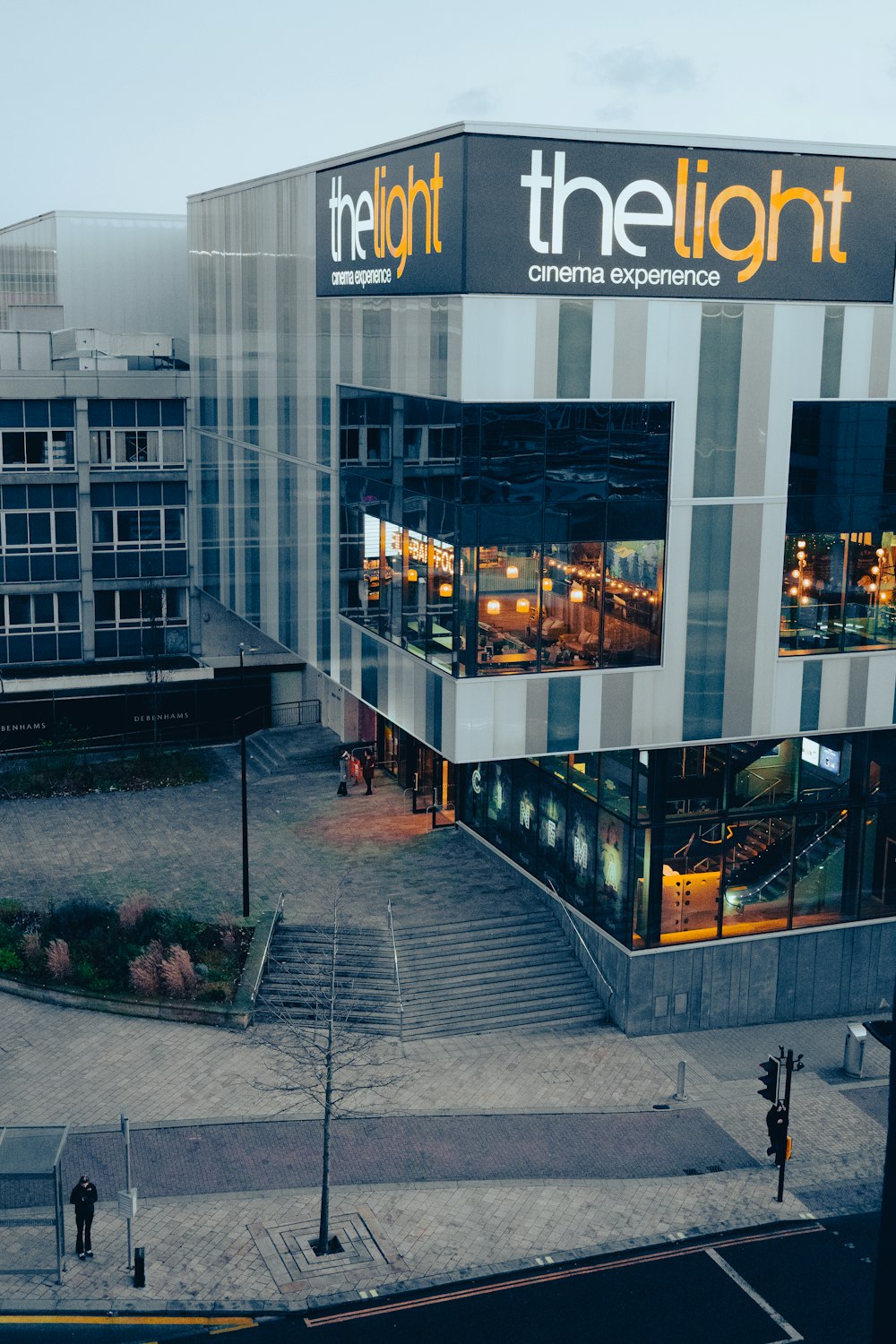 a building with a lot of windows and stairs