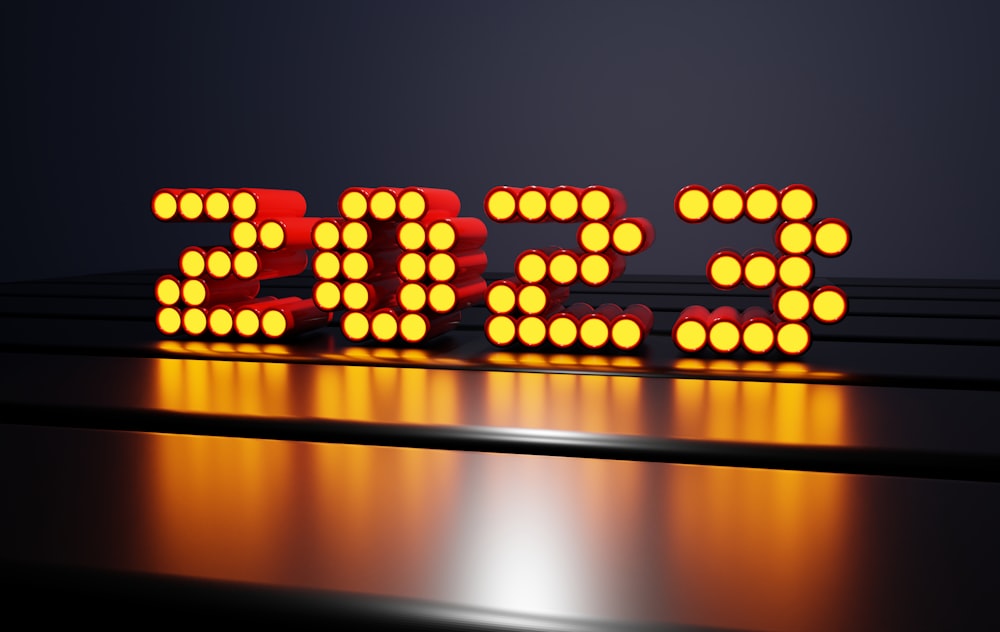 a close up of a lit up sign on a table
