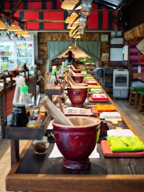 a long table with a bowl of food on top of it