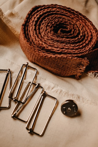 a roll of twine next to a pair of scissors