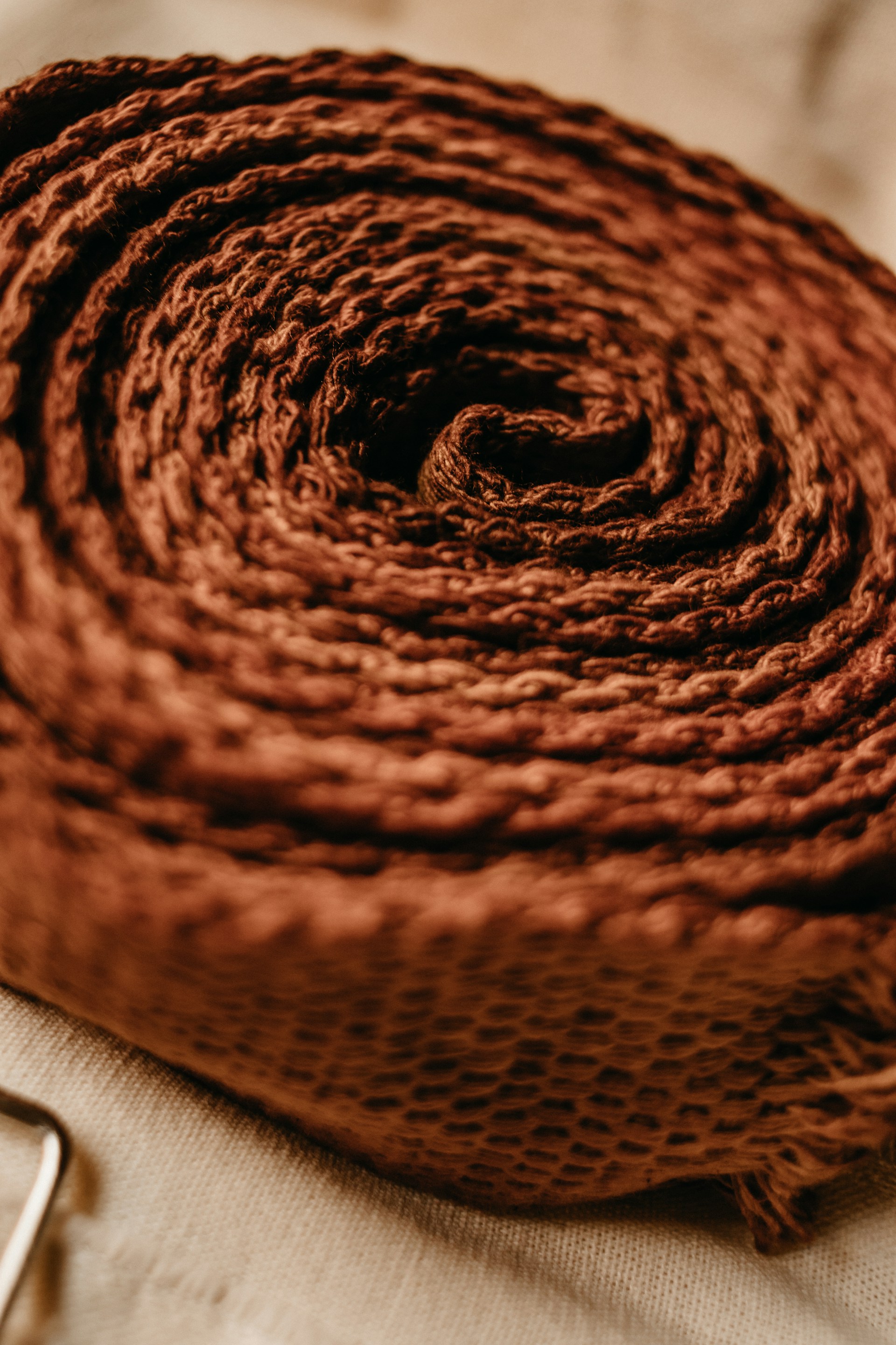 a roll of yarn sitting on top of a table
