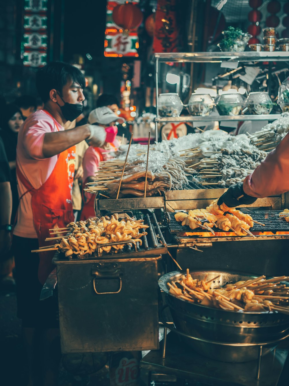 a man is cooking food on a grill