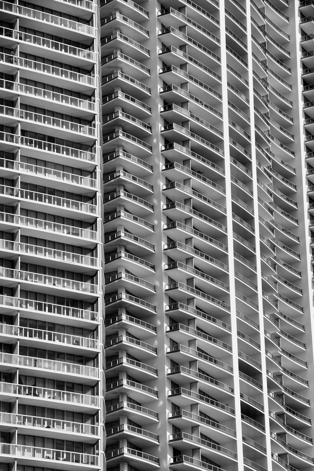 a black and white photo of a tall building