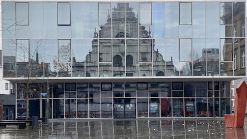 Restored historic building facade blending old and new elements.