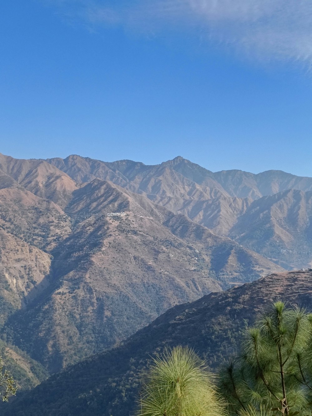 a view of a mountain range from a distance