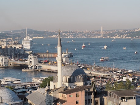 A vibrant image showcasing the bustling city of Dakar with a focus on its strategic port.