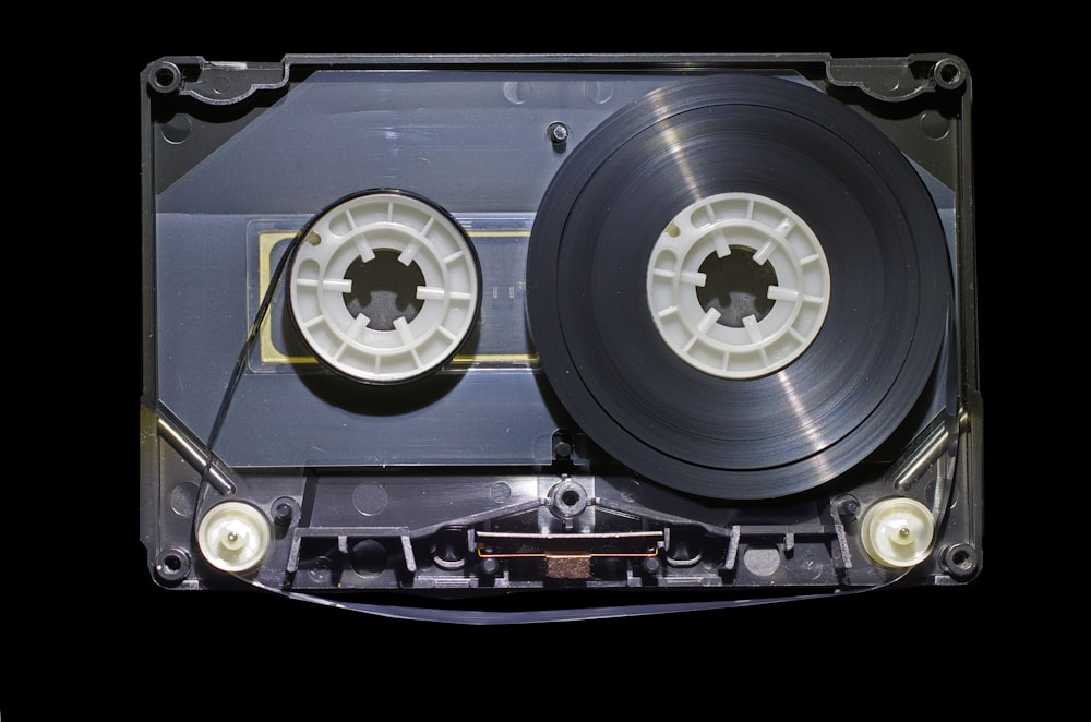 a close up of an old fashioned audio cassette