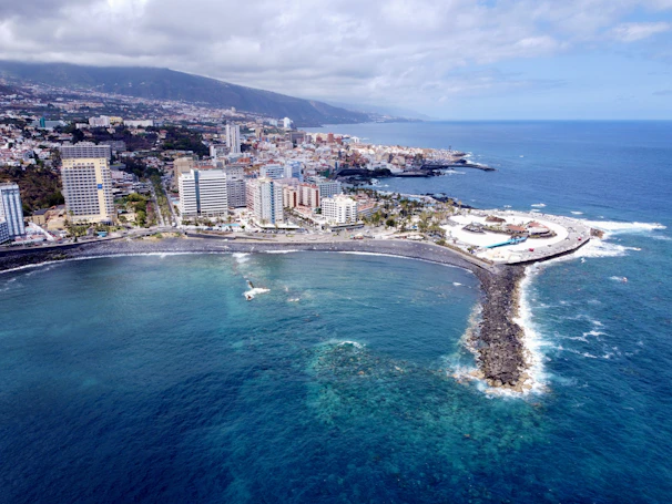 a large body of water next to a city