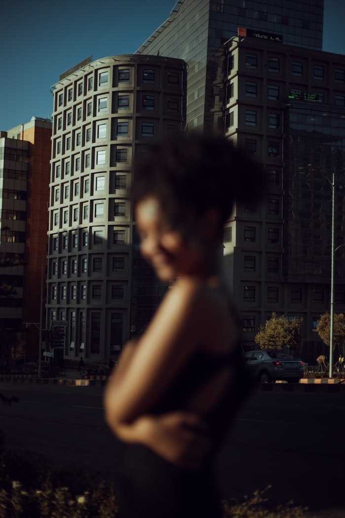 Addis Ababa singles dating — woman connecting with matches near the city skyline