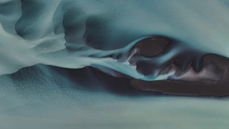 a close up of a piece of art that looks like a face