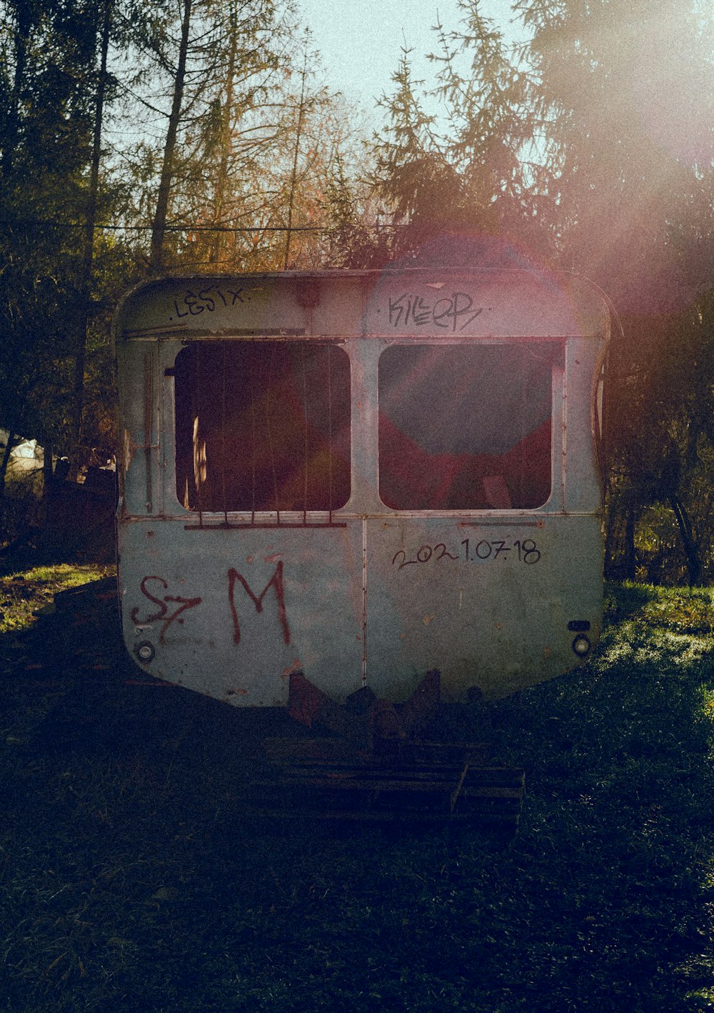 an old train car with graffiti on it